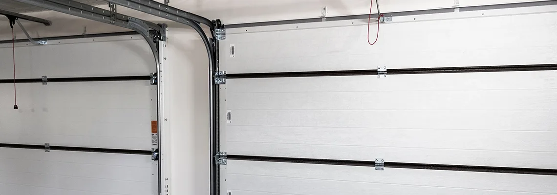 Fix Folding Garage Door Jerking in Miami Beach, Florida